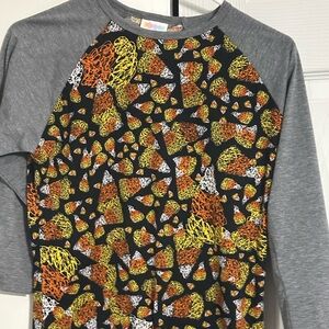 Lularoe Halloween randy t shirt. Candy corn. Very cute. Nwot. XS